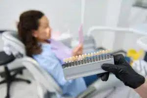 Dentist presenting dental veneers