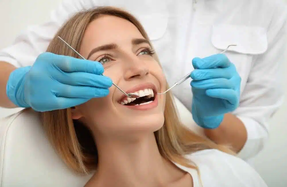 Patient consulting dentist for smile makeover plan
